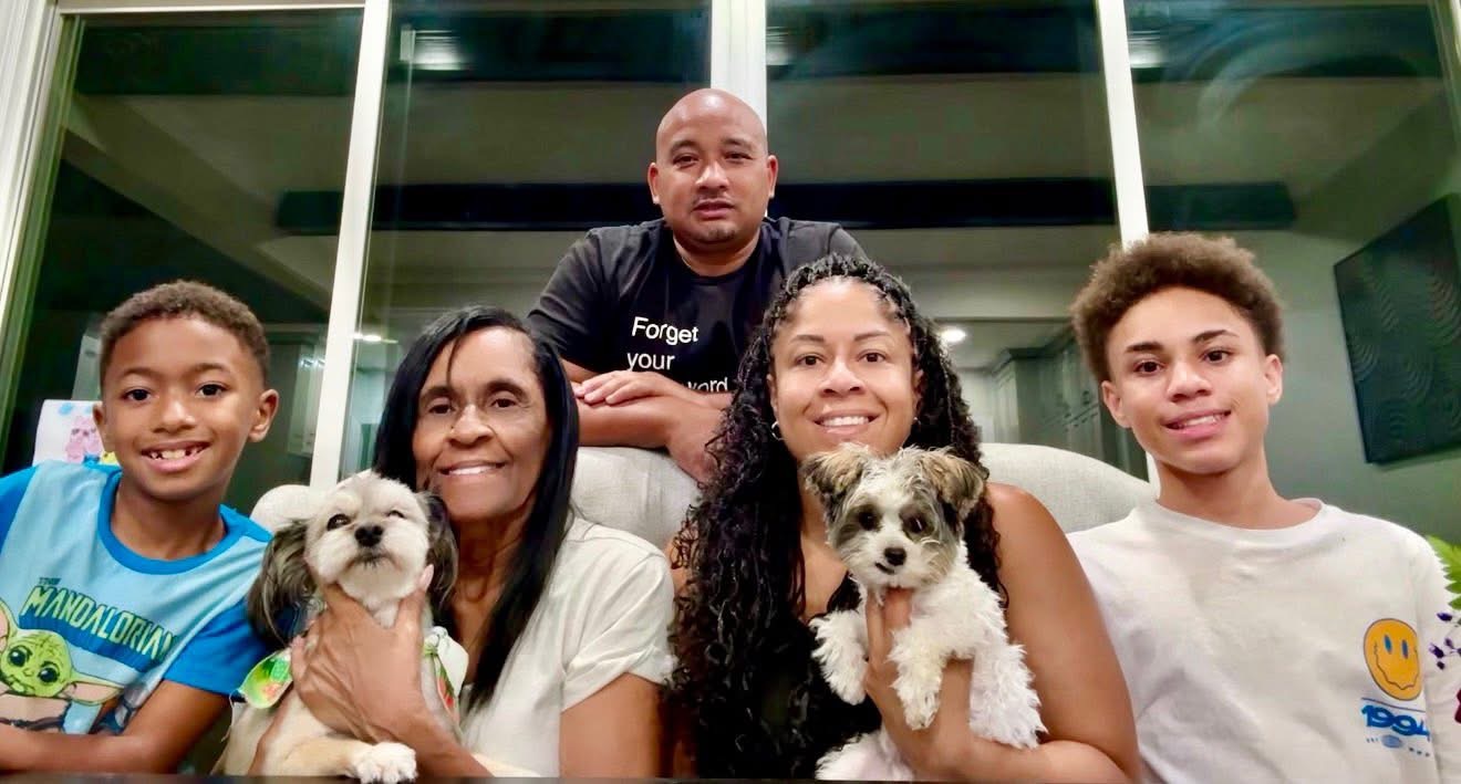 Angela Sorapuru-Lopez with her family at home