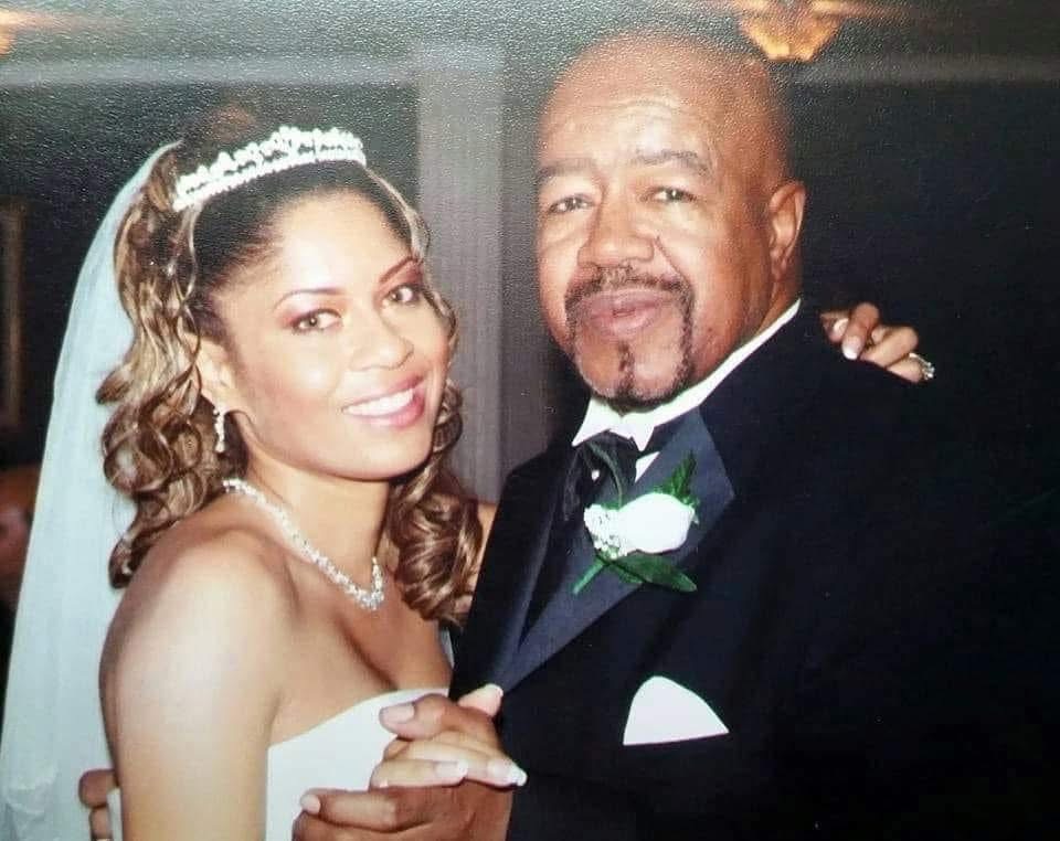 Angela dancing with her father on her wedding day